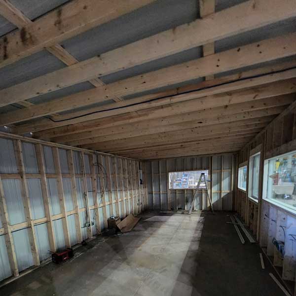 Drywall damage before repair in St. Louis
